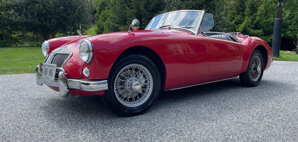 Vintage red MG MGA classic roadster with mirror-like ceramic coating finish by DB Detail near Baltimore.