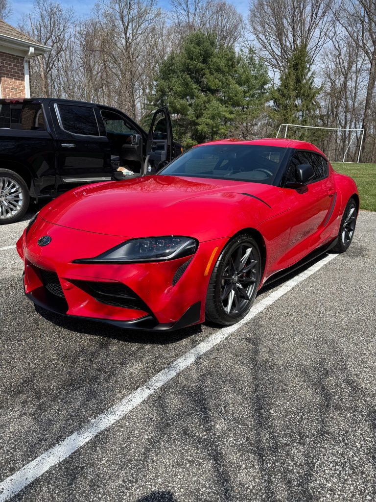 Full-service car detailing in Boston, MA residential driveway
